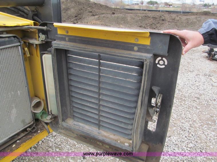 image for item E5818 New Holland C19 track skid steer