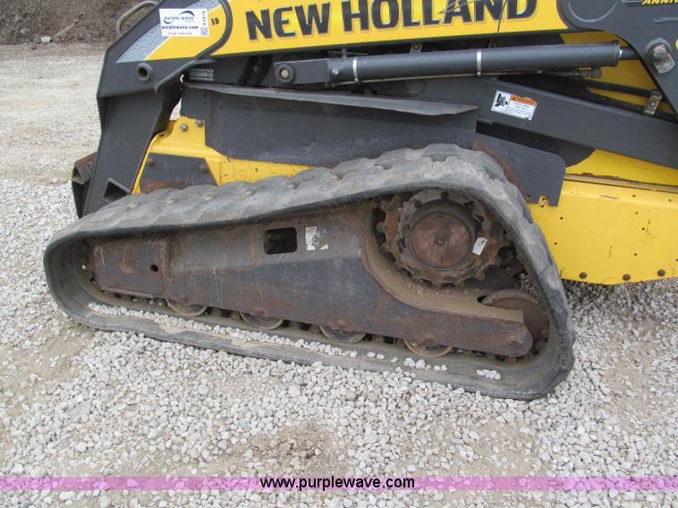 image for item E5818 New Holland C19 track skid steer