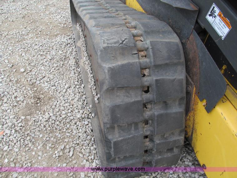image for item E5818 New Holland C19 track skid steer