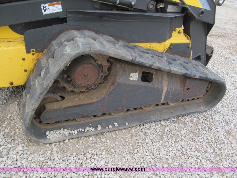 image for item E5818 New Holland C19 track skid steer