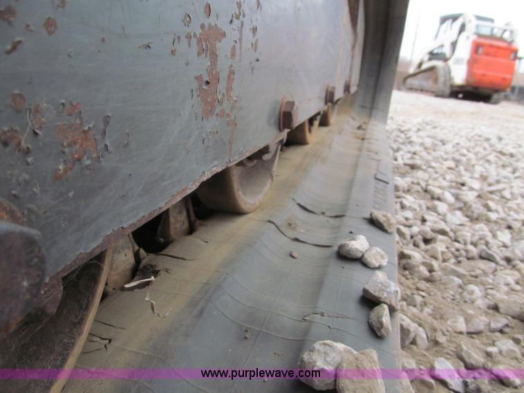 image for item E5818 New Holland C19 track skid steer