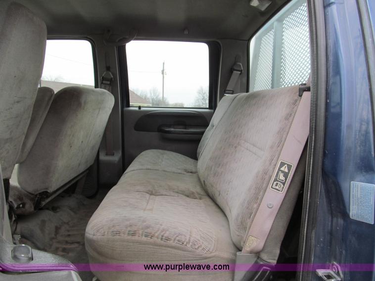 image for item E5833 2000 Ford F750 XLT quad cab flatbed truck