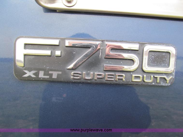 image for item E5833 2000 Ford F750 XLT quad cab flatbed truck