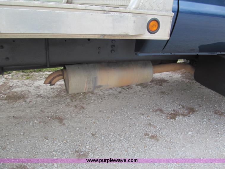 image for item E5833 2000 Ford F750 XLT quad cab flatbed truck