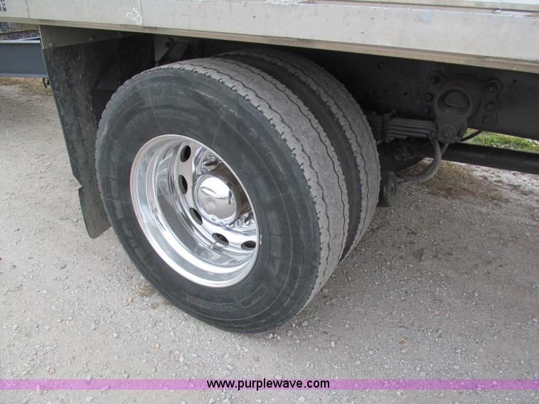 image for item E5833 2000 Ford F750 XLT quad cab flatbed truck