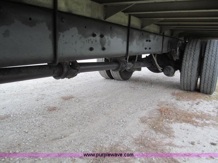 image for item E5833 2000 Ford F750 XLT quad cab flatbed truck