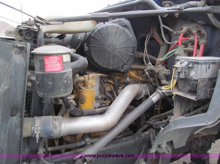 image for item E5833 2000 Ford F750 XLT quad cab flatbed truck