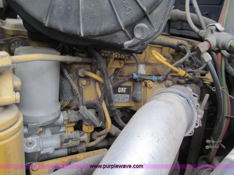 image for item E5833 2000 Ford F750 XLT quad cab flatbed truck