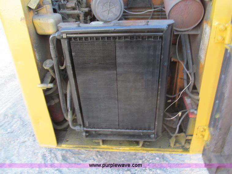 image for item E5840 1998 Mustang 2050 skid steer