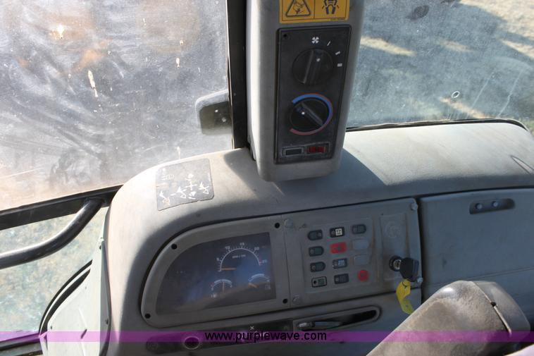 image for item E8249 2002 Terex TX760 backhoe