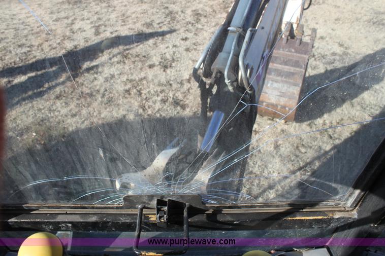 image for item E8249 2002 Terex TX760 backhoe