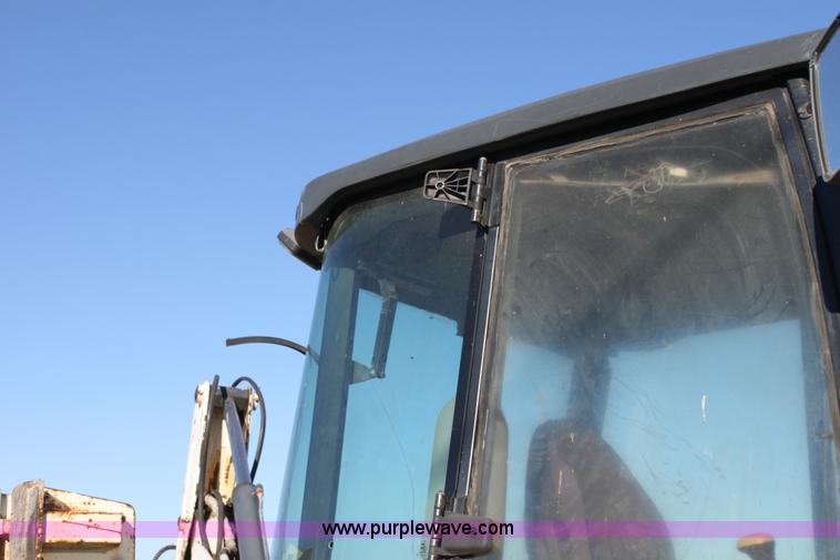 image for item E8249 2002 Terex TX760 backhoe