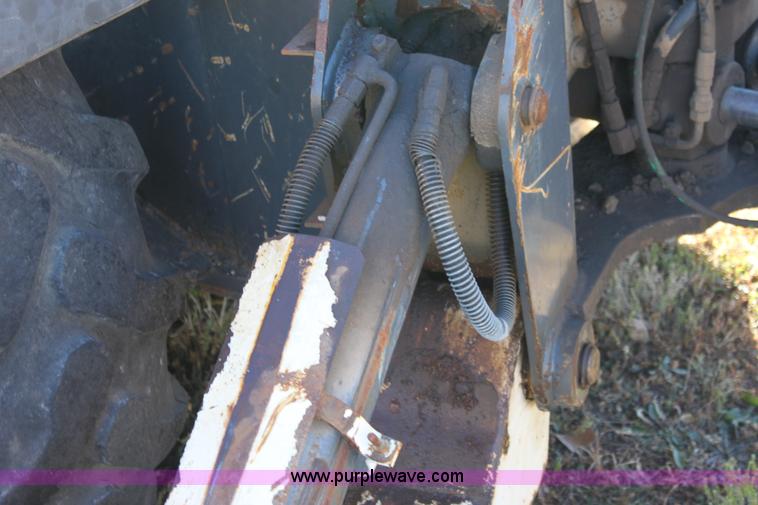 image for item E8249 2002 Terex TX760 backhoe