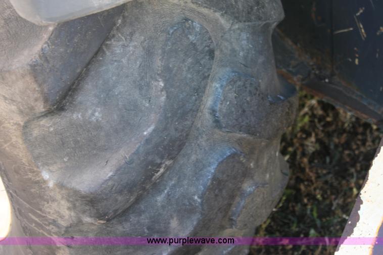 image for item E8249 2002 Terex TX760 backhoe