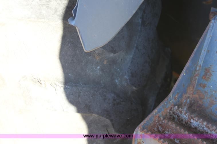 image for item E8249 2002 Terex TX760 backhoe