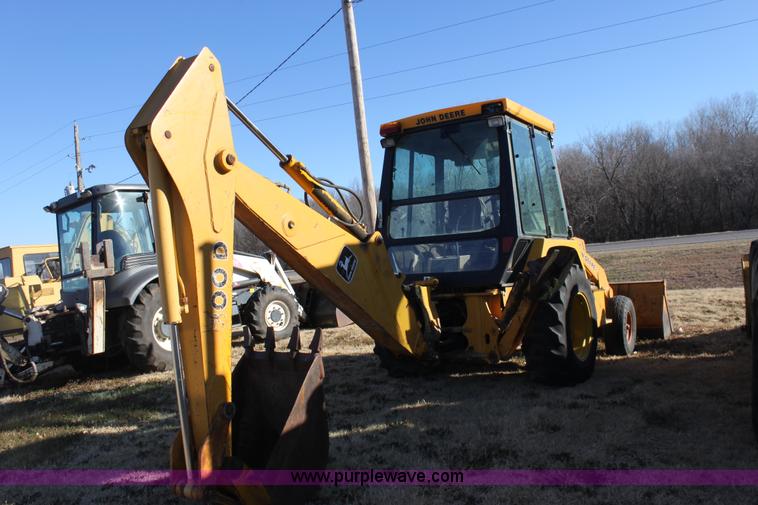 image for item E8250 1991 John Deere 300D backhoe