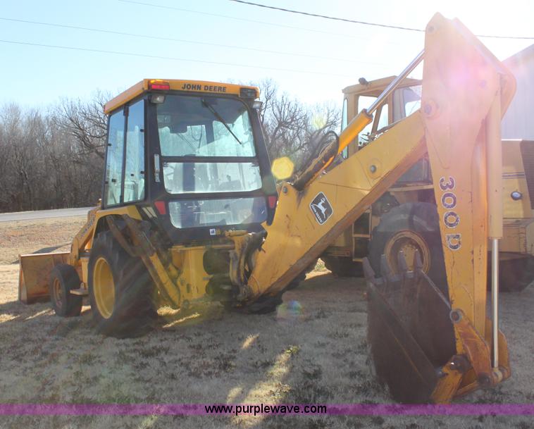 image for item E8250 1991 John Deere 300D backhoe