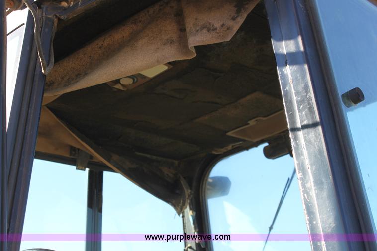 image for item E8250 1991 John Deere 300D backhoe