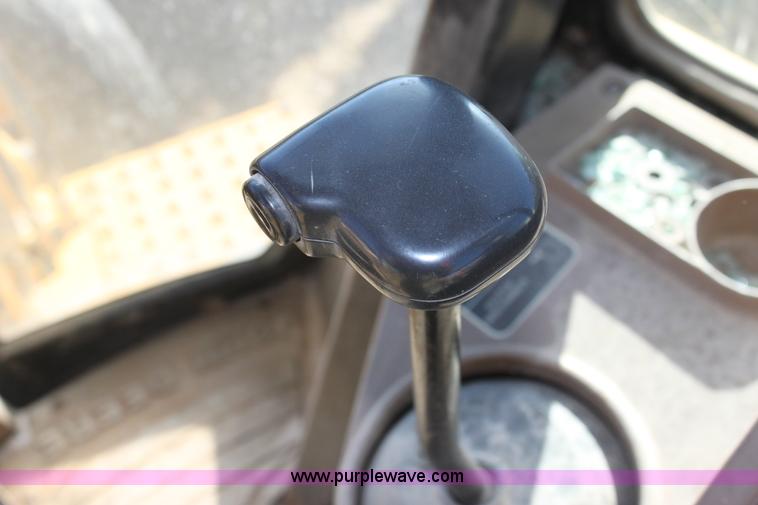 image for item E8250 1991 John Deere 300D backhoe