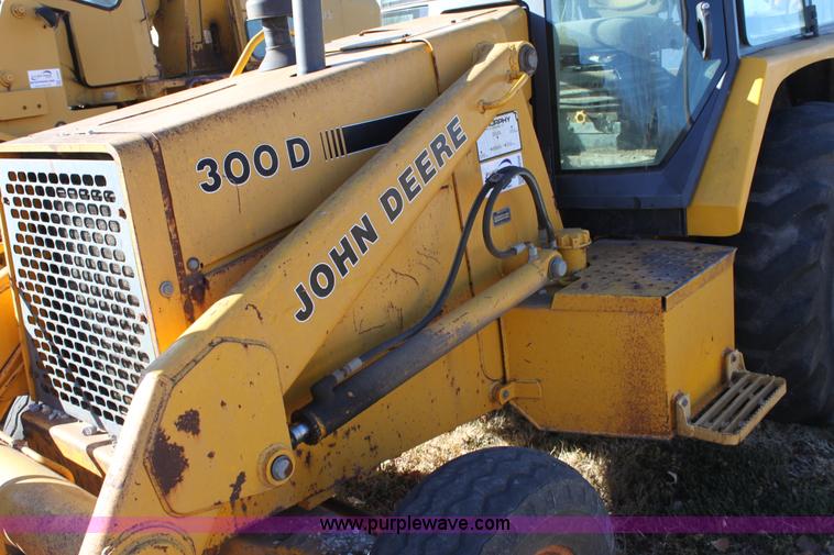 image for item E8250 1991 John Deere 300D backhoe