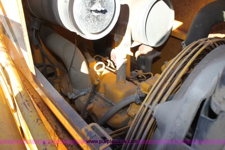 image for item E8250 1991 John Deere 300D backhoe