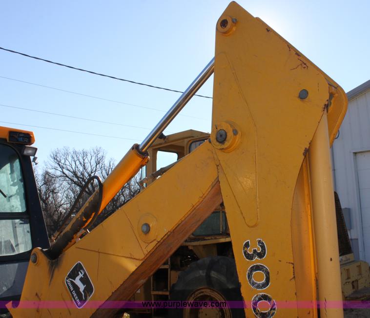 image for item E8250 1991 John Deere 300D backhoe