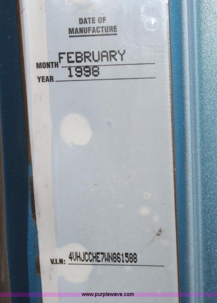 image for item F2712 1998 Volvo WG dump truck