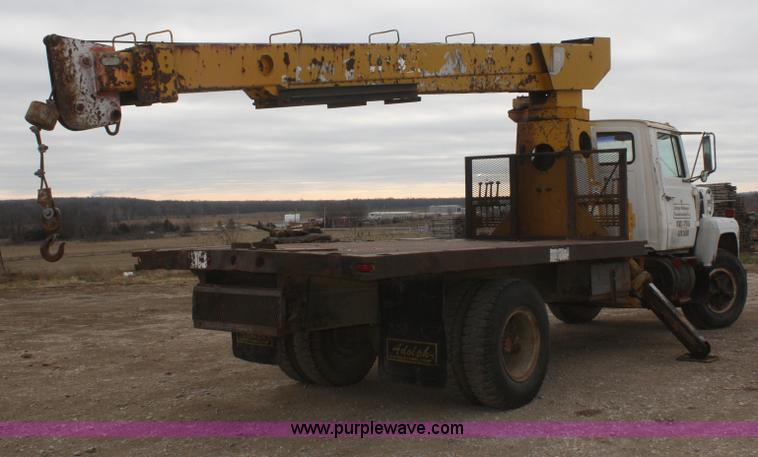 image for item F2910 1974 Ford 800 crane truck