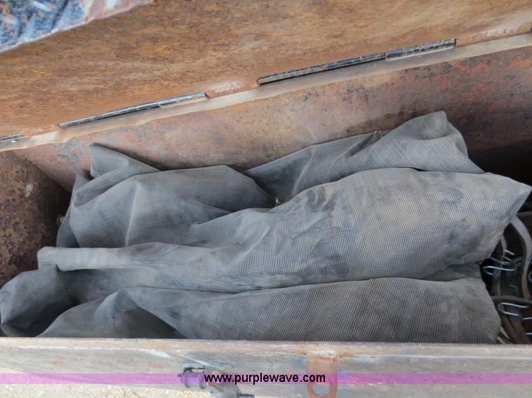 image for item F6557 1990 Mack DM690S roll-off truck