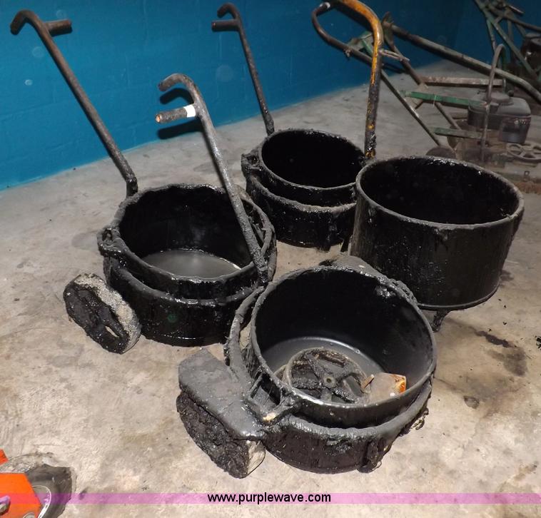 (4) hot tar mop buckets in Liberal, KS Item J9135 sold Purple Wave