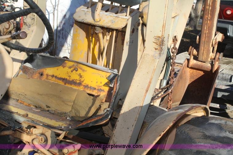 image for item O9817 1965 Case G530 backhoe