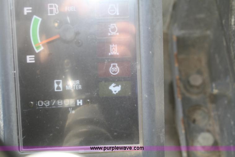 image for item O9871 2004 Takeuchi TL130 skid steer