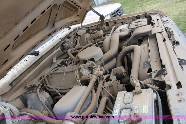 image for item E4221 1988 Ford F350 XL flatbed pickup truck