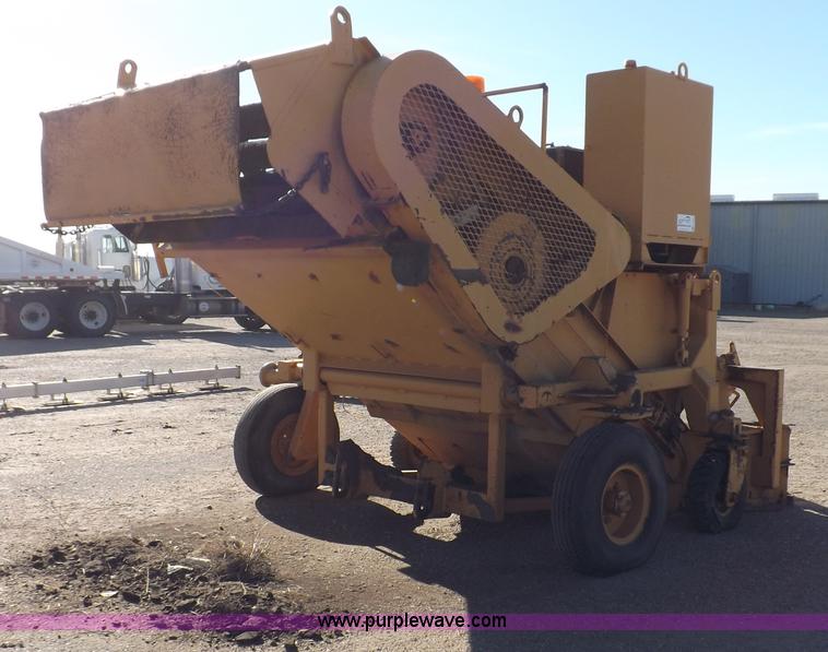 image for item F6343 CMI Corp Windrow asphalt elevating machine