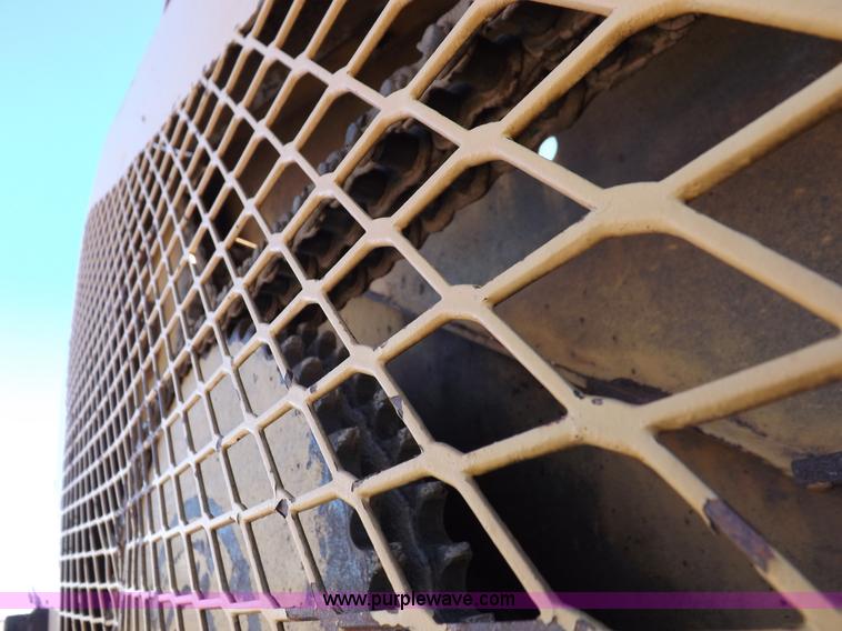 image for item F6343 CMI Corp Windrow asphalt elevating machine