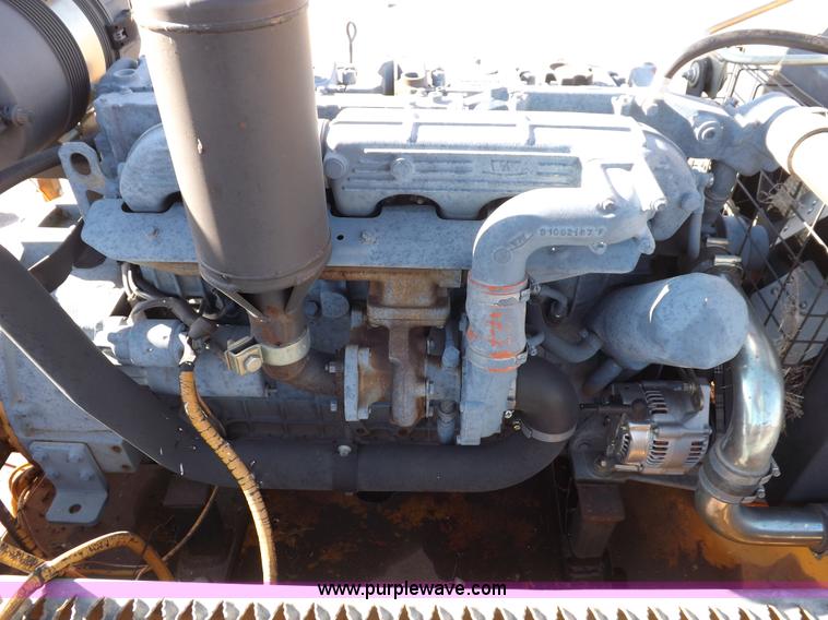 image for item F6343 CMI Corp Windrow asphalt elevating machine