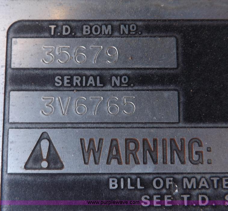 image for item F6343 CMI Corp Windrow asphalt elevating machine