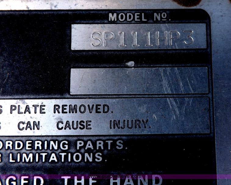 image for item F6343 CMI Corp Windrow asphalt elevating machine