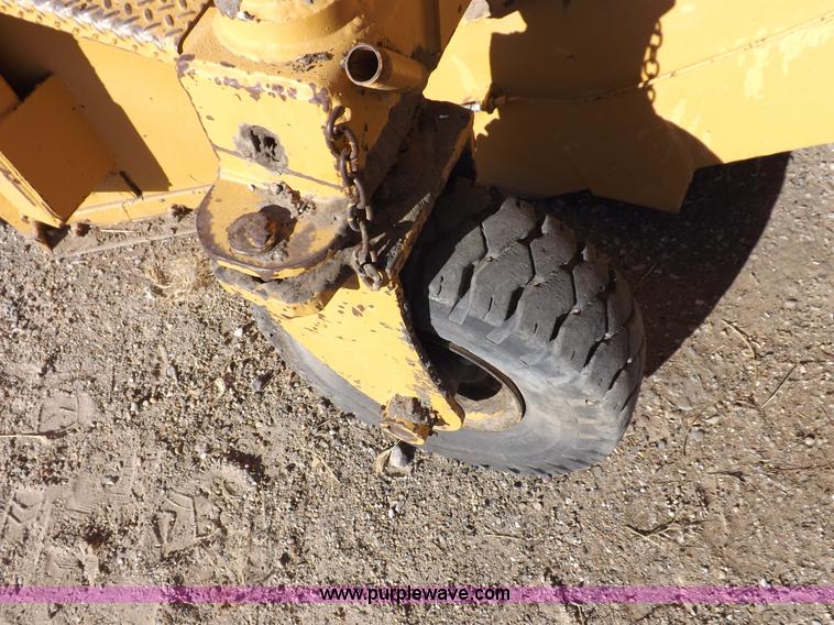 image for item F6343 CMI Corp Windrow asphalt elevating machine