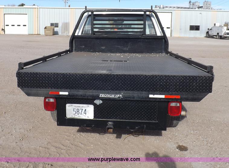 image for item F6354 1990 Chevrolet Cheyenne 2500 flatbed pickup truck