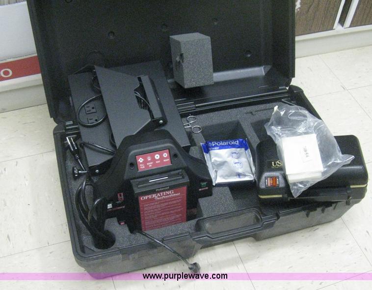 Polaroid badge making system in Newton, KS Item M9156 sold Purple Wave