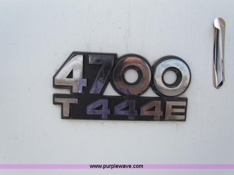 image for item E8210 2000 International 4700 24' box truck