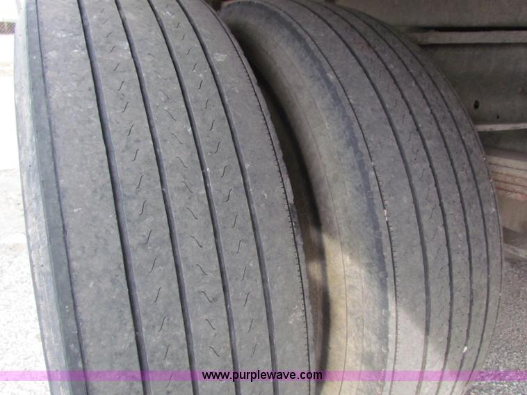 image for item E8210 2000 International 4700 24' box truck