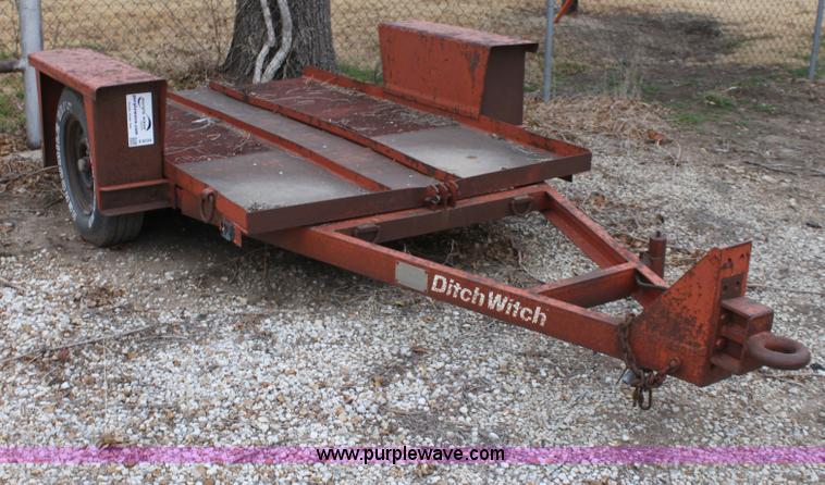 image for item E8239 Ditch Witch tilt deck trailer