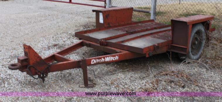 image for item E8239 Ditch Witch tilt deck trailer