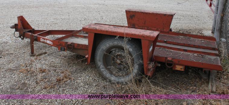 image for item E8239 Ditch Witch tilt deck trailer
