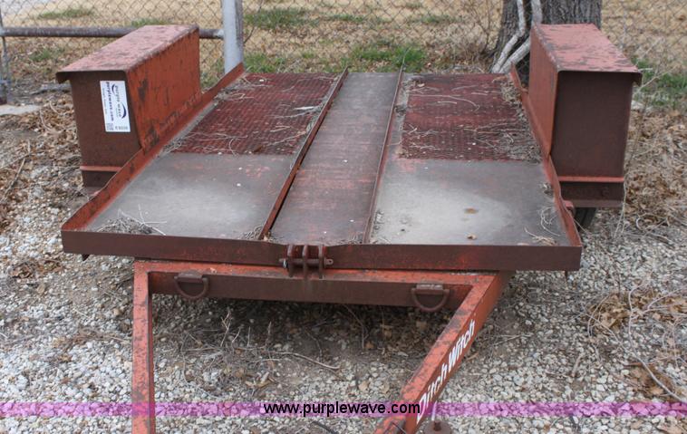 image for item E8239 Ditch Witch tilt deck trailer