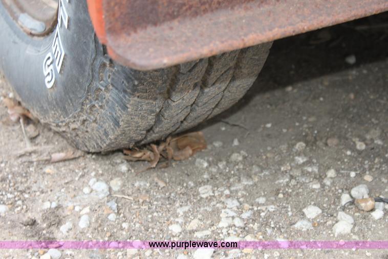 image for item E8239 Ditch Witch tilt deck trailer