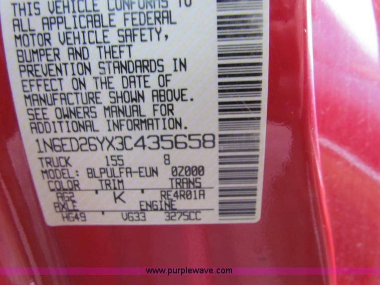 image for item E8282 2003 Nissan Frontier King Cab pickup truck