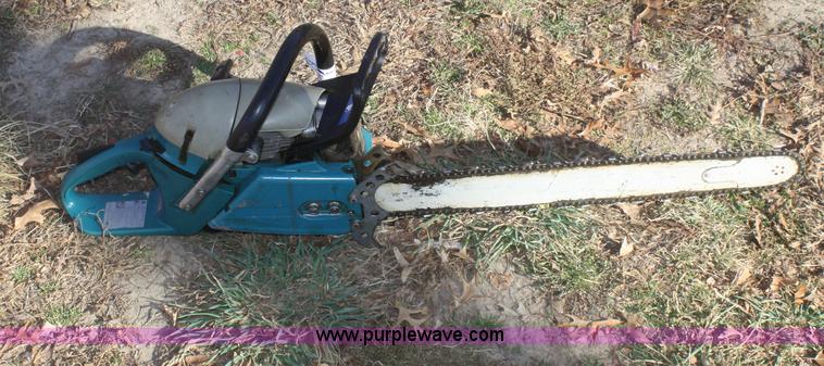 image for item O9833 Makita DCS6401 chainsaw